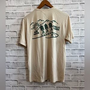 NWT! Adult sized ROARK run amok Pubic Lands tan short sleeve t-shirt Small